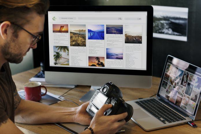 Photographer working on a computer
