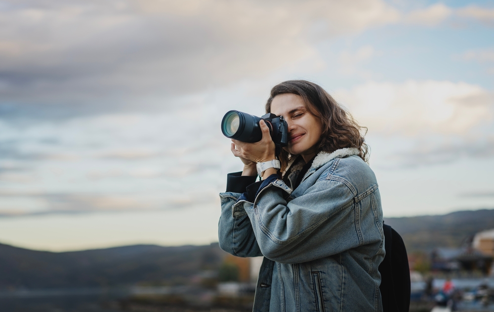 photographer using a zoom lens