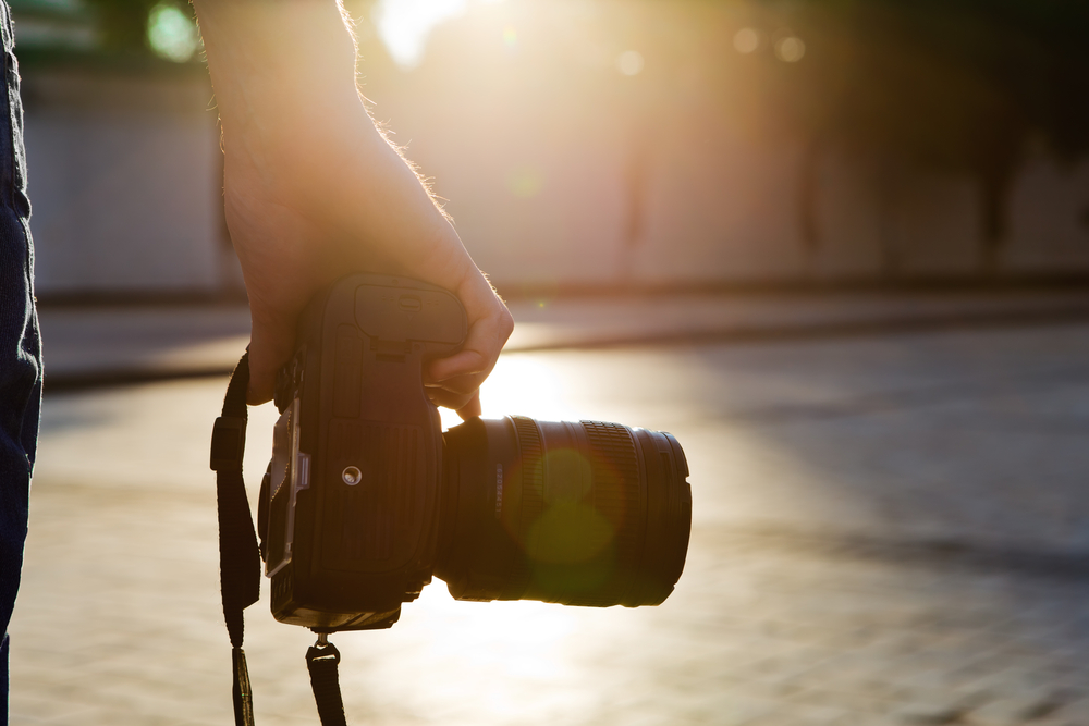 person holding a camera