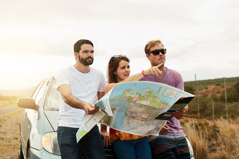 group of friends making travel plans