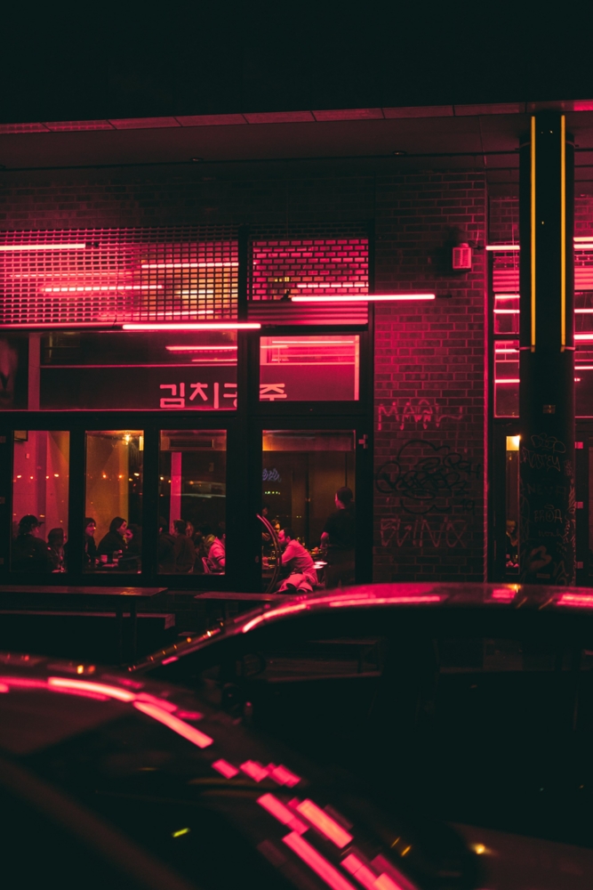 Cafe with red lights at night