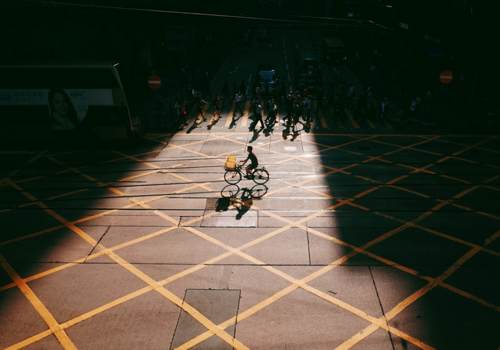 Man riding a bike in the street