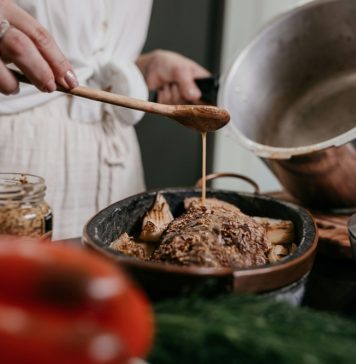 Action Shots in Food Photography: Capturing Pours, Sprinkles, and Steam Chef pouring gravy from a pot