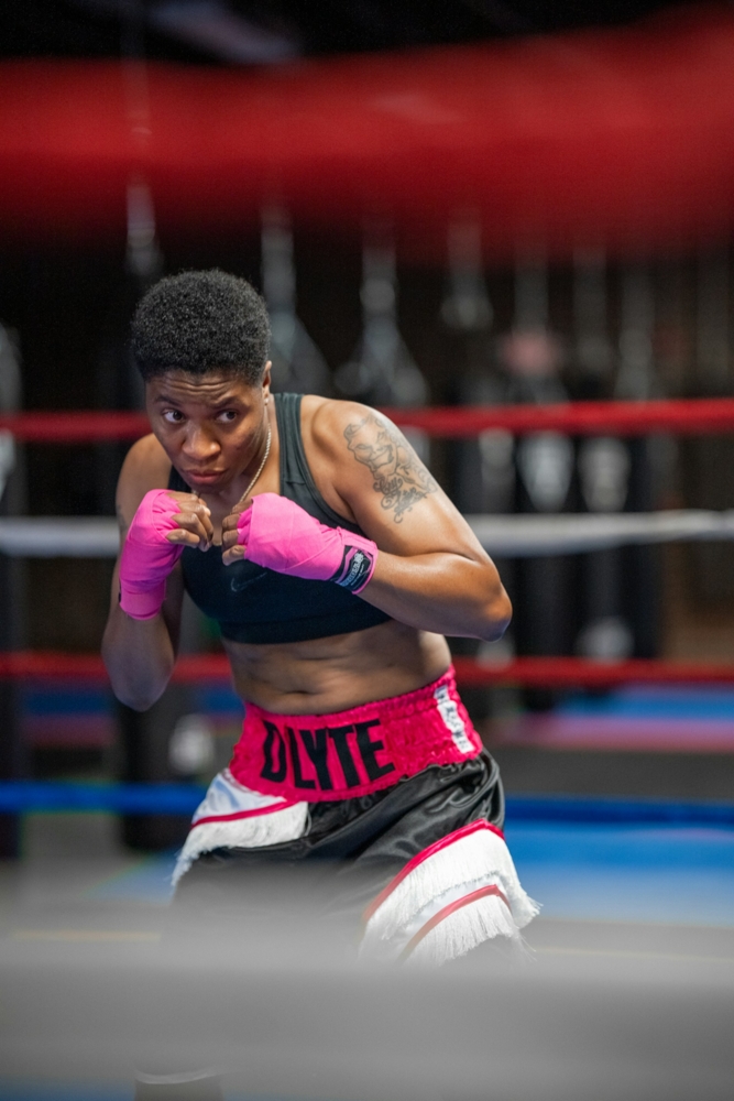 Boxer with pink hand wraps