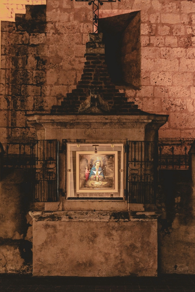 small shrine with a cross on top
