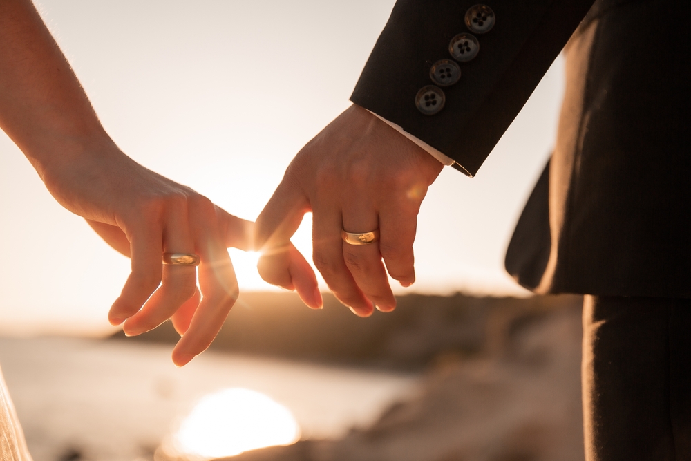Wedding rings at golden hour