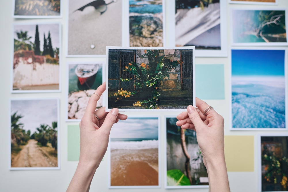 Photographer holding a print