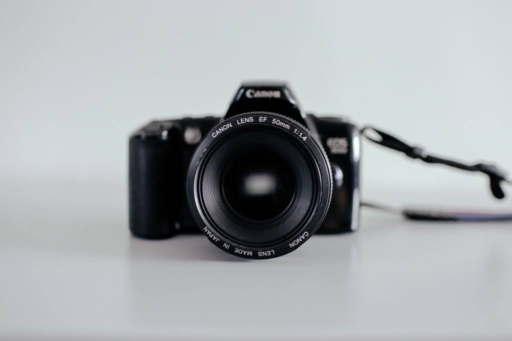older canon camera with 50mm lens