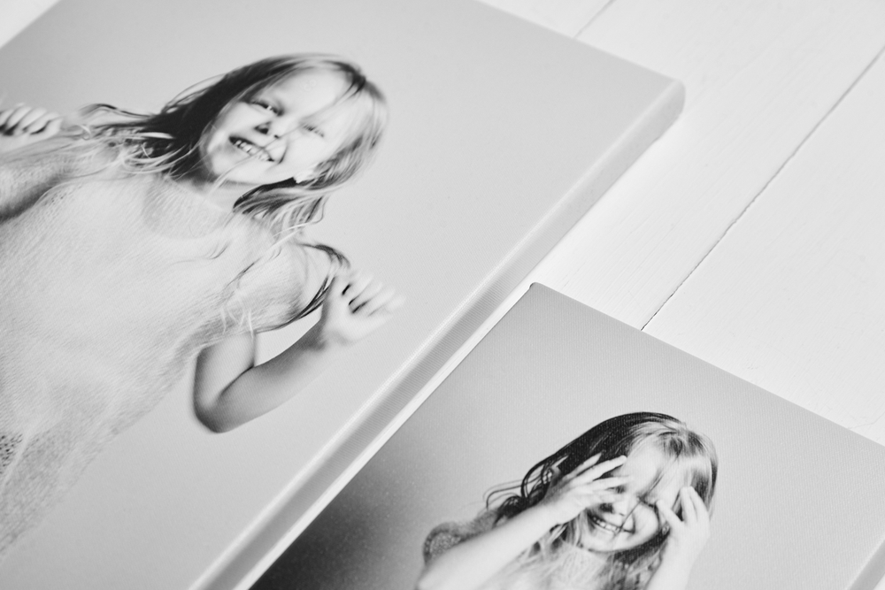 black and white canvas prints of a happy young girl