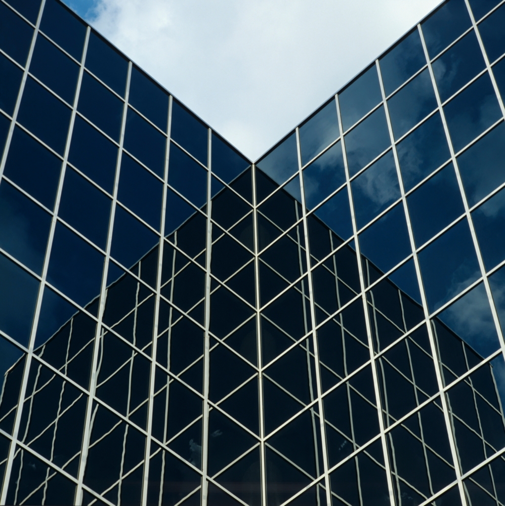 Overlapping lines on the side of a sky scraper