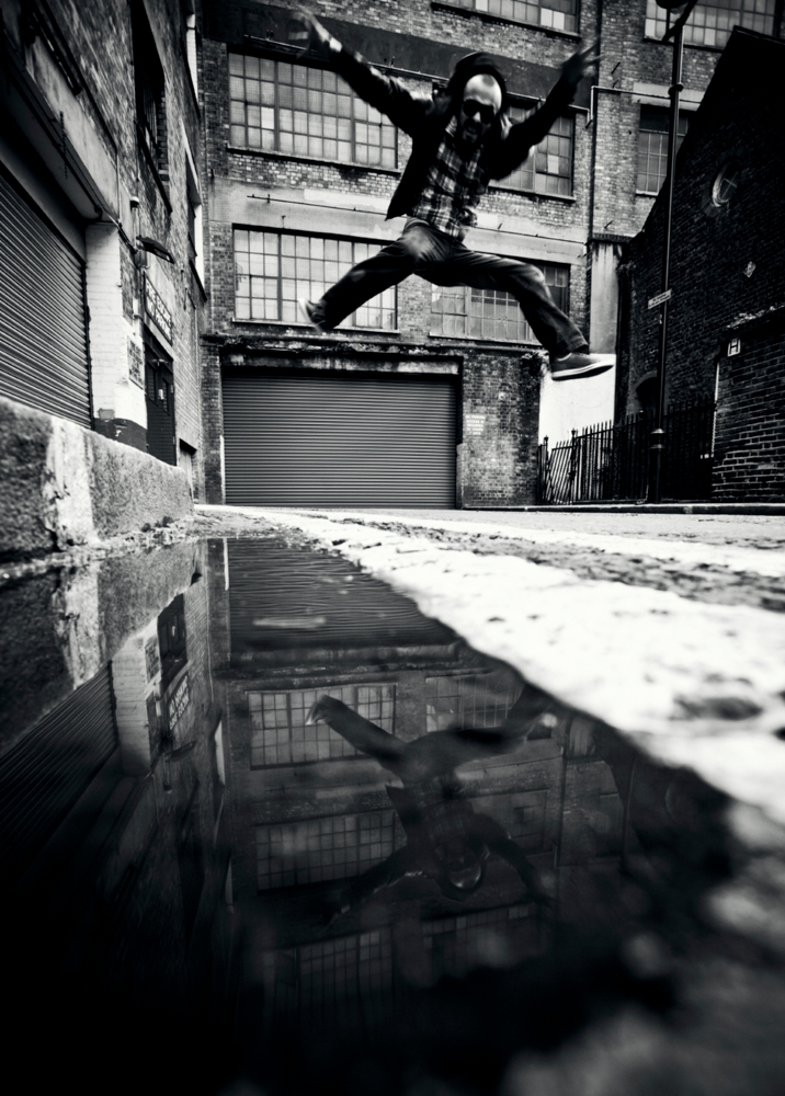 Man jumping in an abandoned building