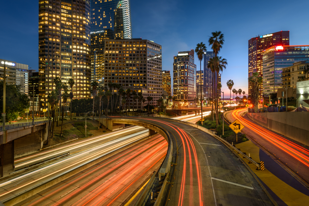 Downtown Los Angeles at night with car traffic light trails