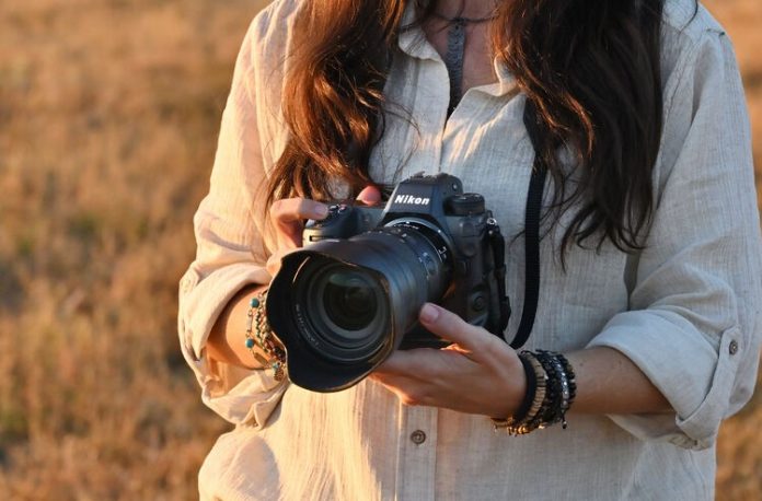 person using a Nikon Z9