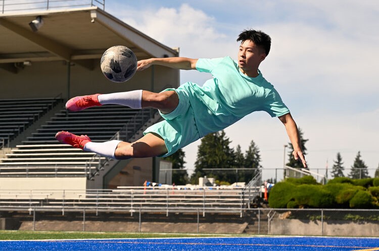 Nikon Z9 man kicking soccer ball