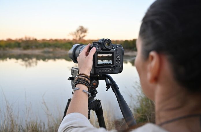 Nikon Z9 person taking landscape photo