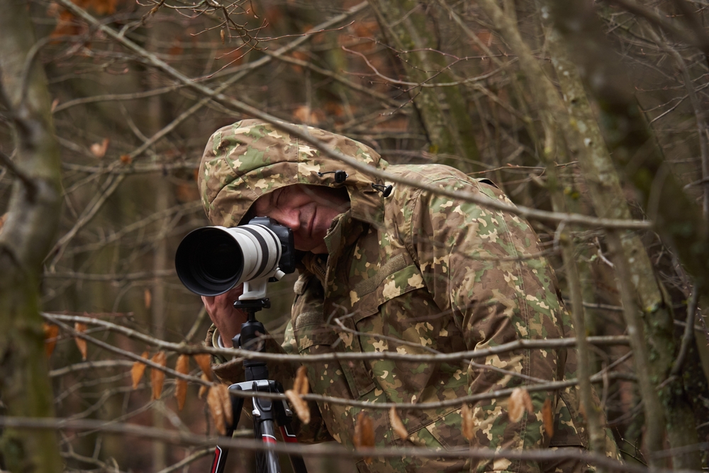 photographer with camouflage