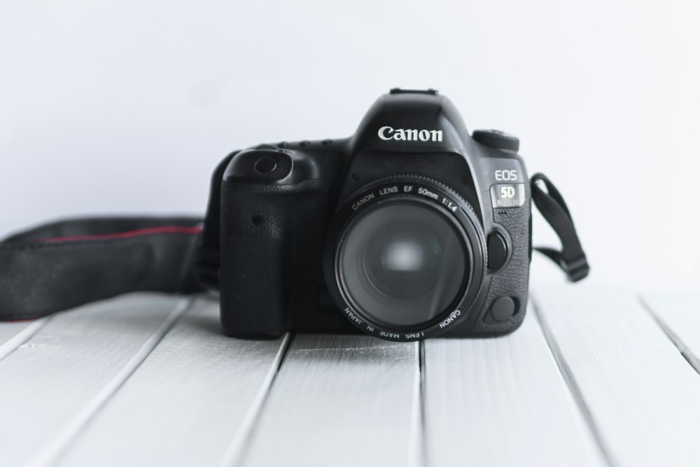 Canon EOS 5D Mark IV on a white table