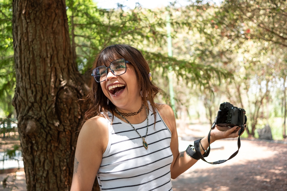Smiling photographer in the field