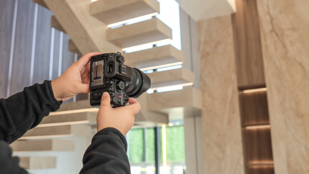 real estate photographer taking interior shot